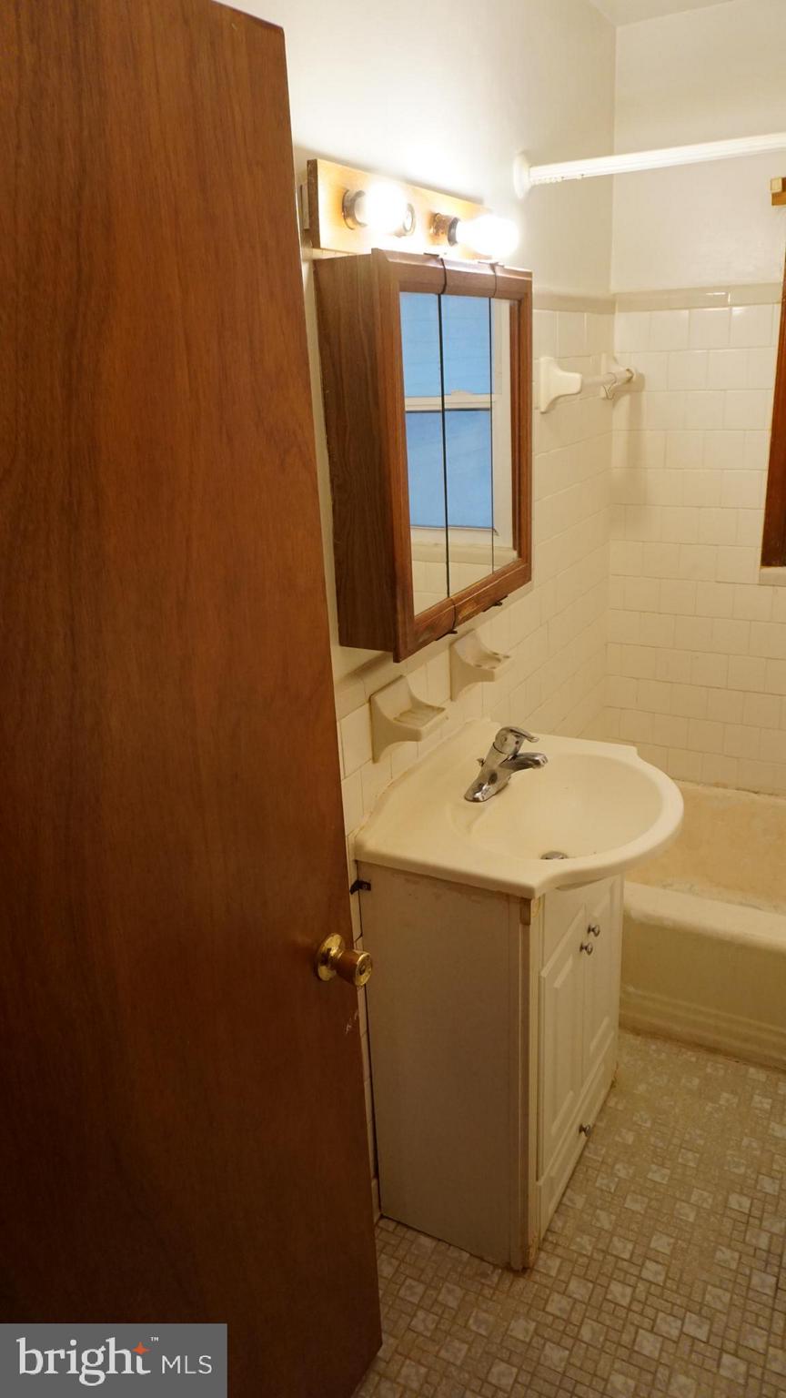 45927 Rolling Road Lexington Park, MD 20653 - Photo 23 of 31 a bathroom with a sink and mirror
