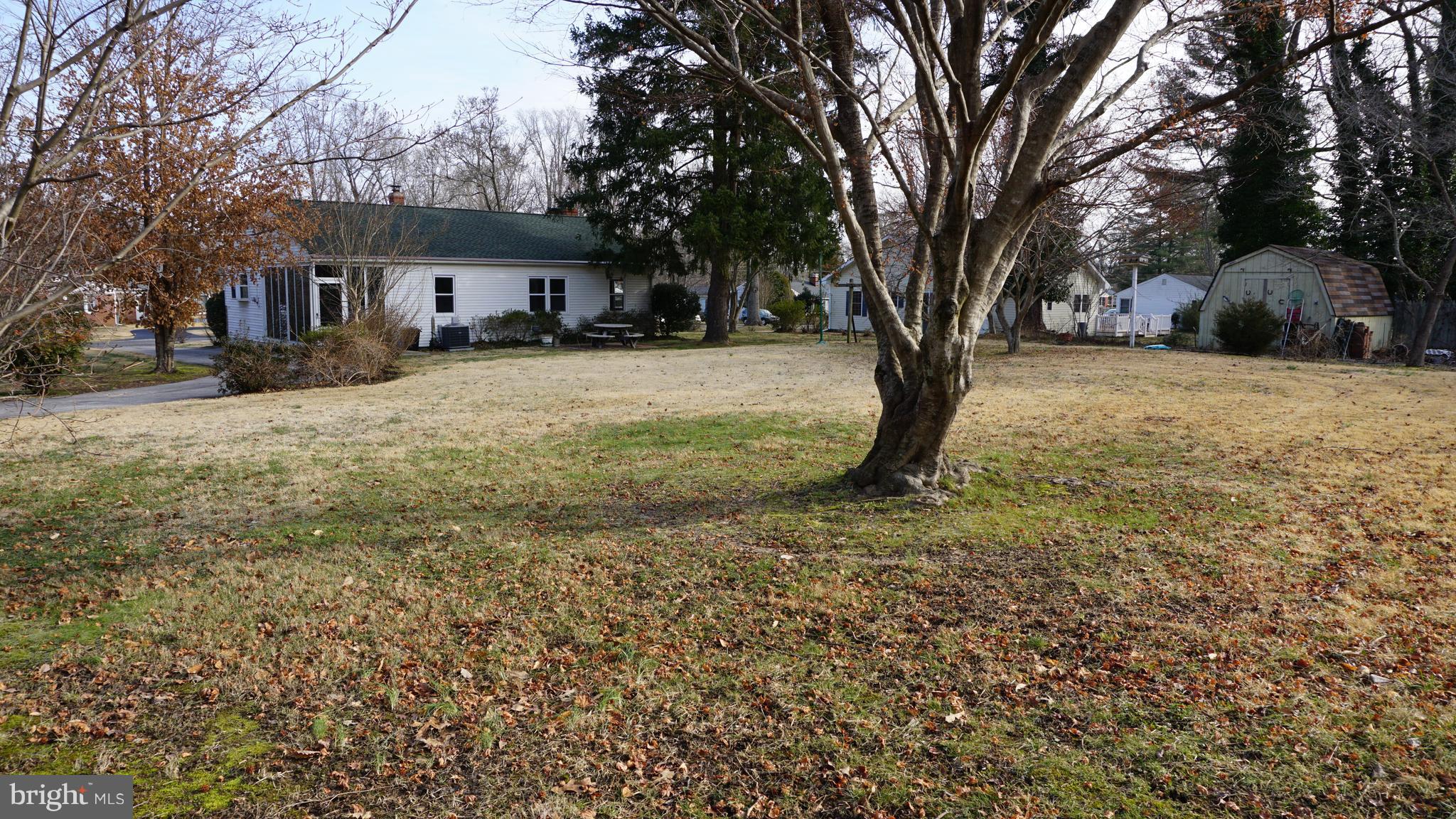 45927 Rolling Road Lexington Park, MD 20653 - Photo 27 of 31 a view of a house with a yard covered in snow