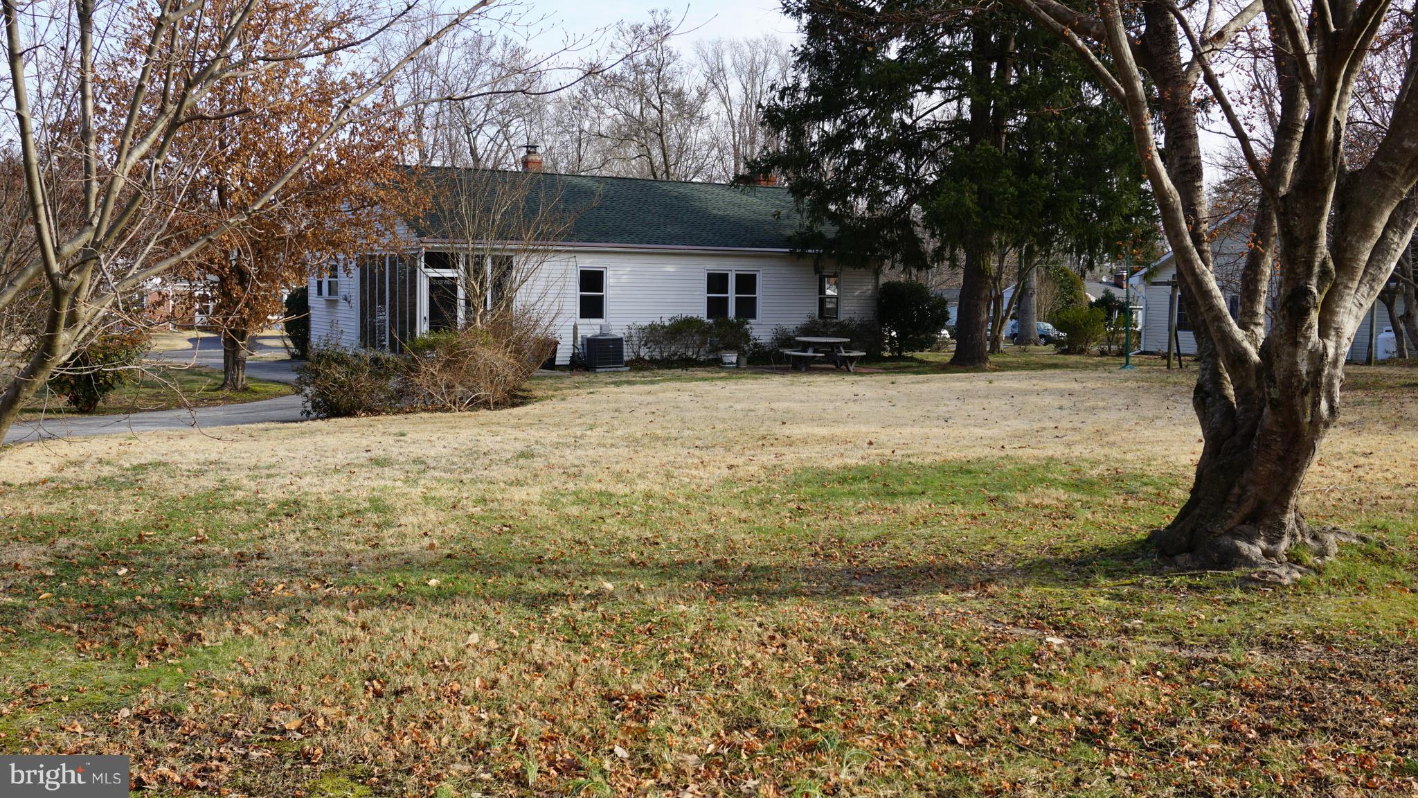 45927 Rolling Road Lexington Park, MD 20653 - Photo 29 of 31 a view of a house with a yard covered with snow