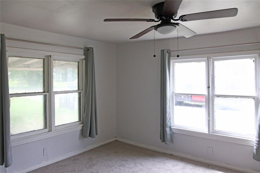 1508 Witt Street Waco, TX 76704 - Photo 14 of 37 Spare room featuring light carpet and ceiling fan
