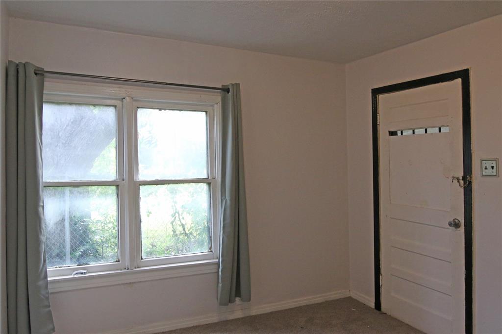 1508 Witt Street Waco, TX 76704 - Photo 20 of 37 Carpeted spare room with baseboards