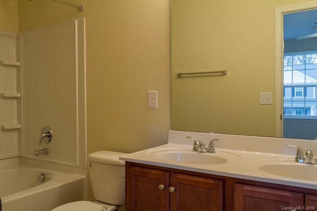 2101 Gunnars Ridge Road, Unit 15 Lancaster, SC 29720 - Photo 12 of 13 a bathroom with a sink and a bathtub