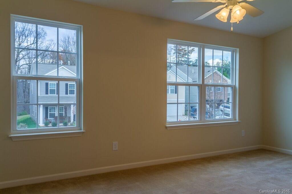 2101 Gunnars Ridge Road, Unit 15 Lancaster, SC 29720 - Photo 5 of 13 a view of an empty room with a window