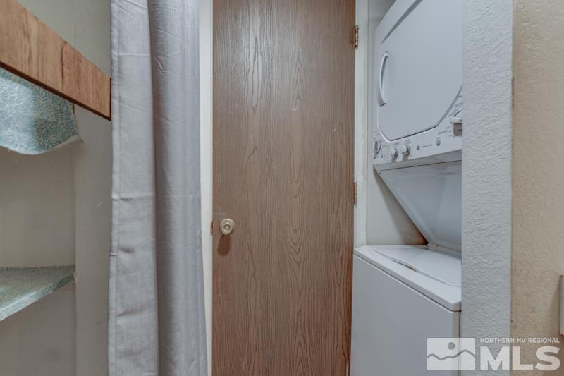 4428 Matich Drive Reno, NV 89502 - Photo 9 of 26 a view of a hallway with washer and dryer