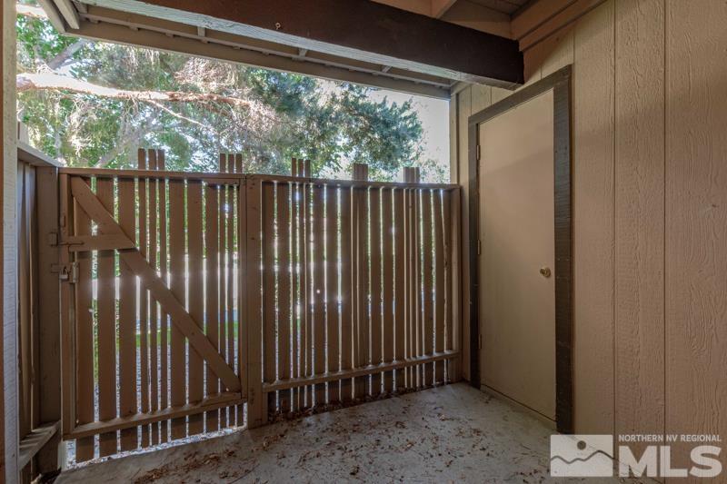 4428 Matich Drive Reno, NV 89502 - Photo 10 of 26 a view of a porch with wooden floor