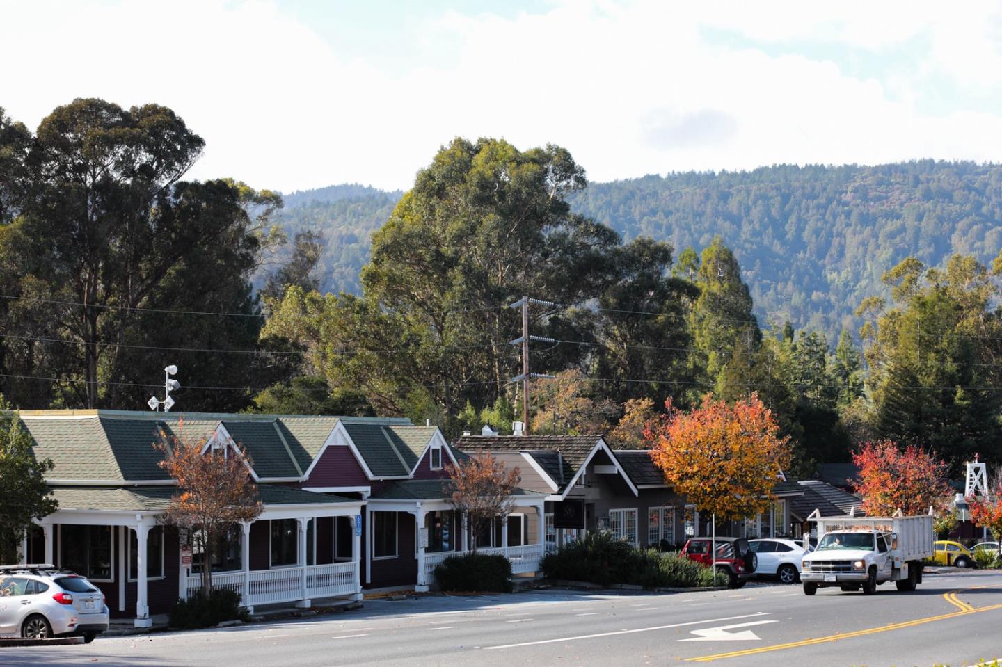 385 Moore Road Woodside, CA 94062 - Photo 16 of 25 a front view of a building with lot of cars and trees