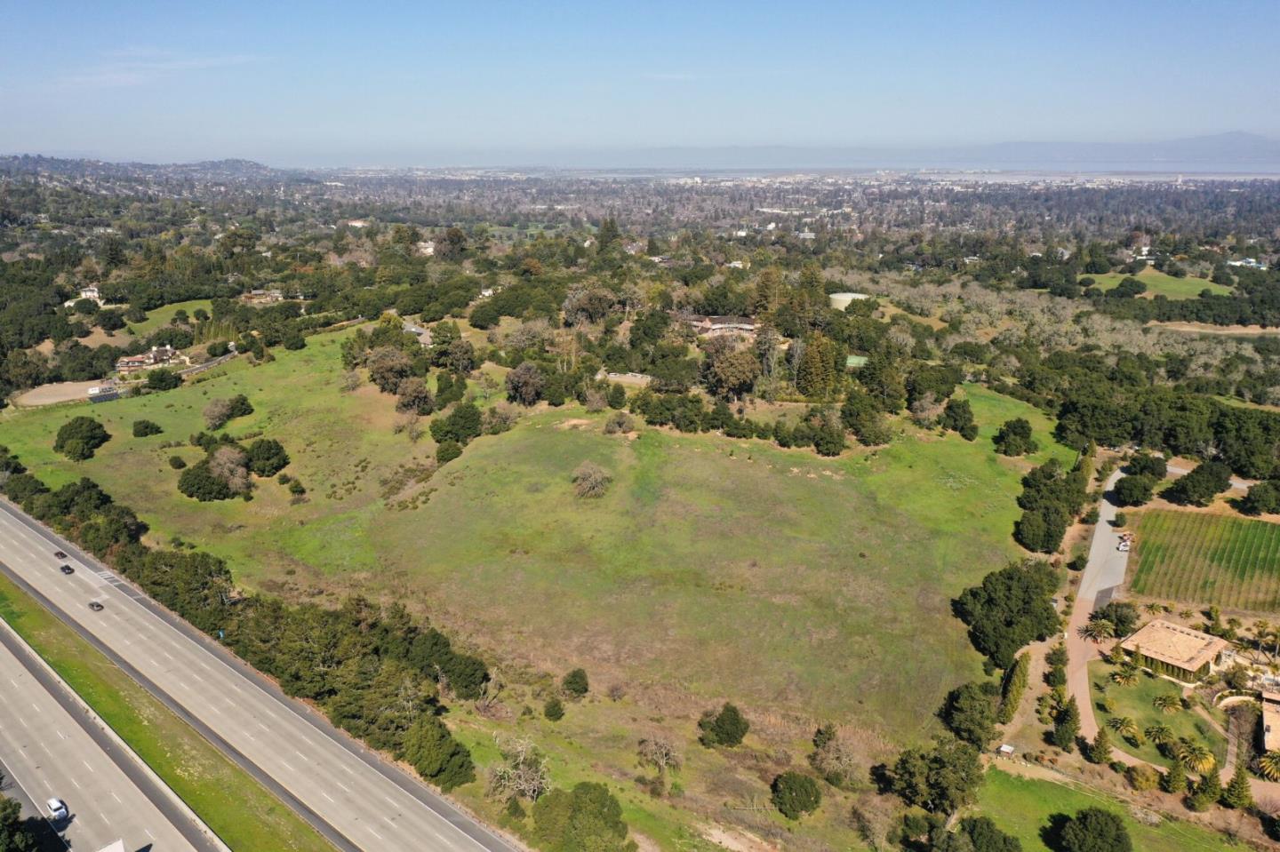 385 Moore Road Woodside, CA 94062 - Photo 6 of 25 an aerial view of residential houses with outdoor space