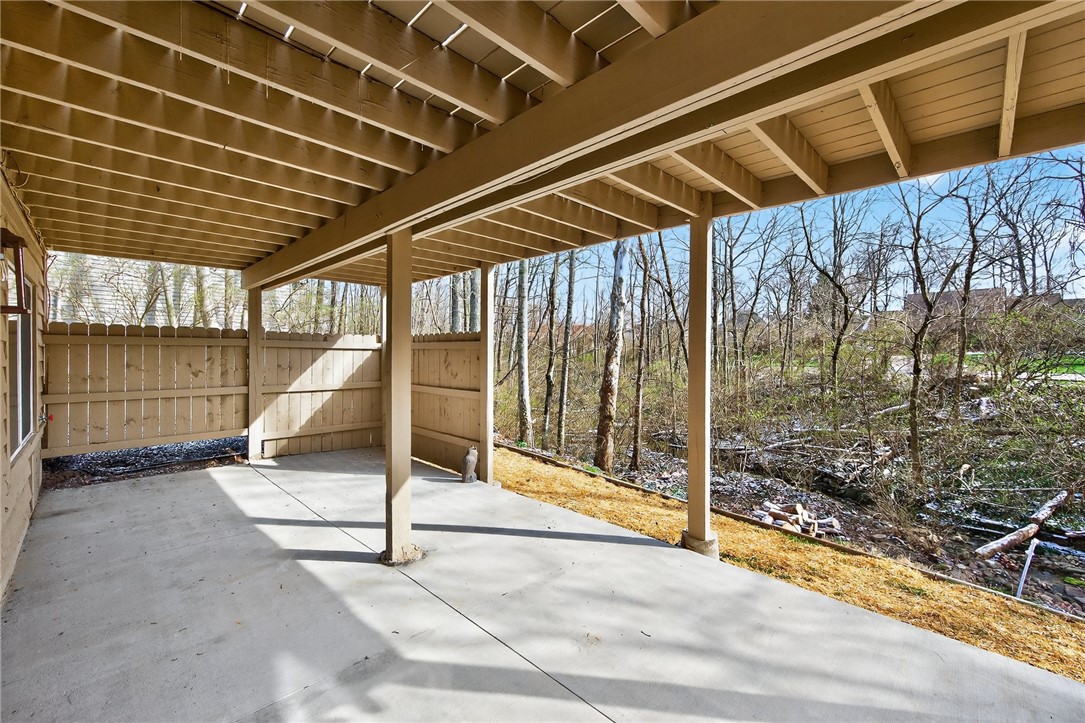 811 Wind Bluff Point Springboro, OH 45066 - Photo 50 of 51 This spacious patio offers an idyllic retreat with a serene woodland backdrop.