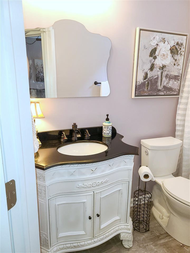 3234 Enchanting Way Raleigh, NC 27616 - Photo 12 of 30 New Granite Vanity and Flooring!