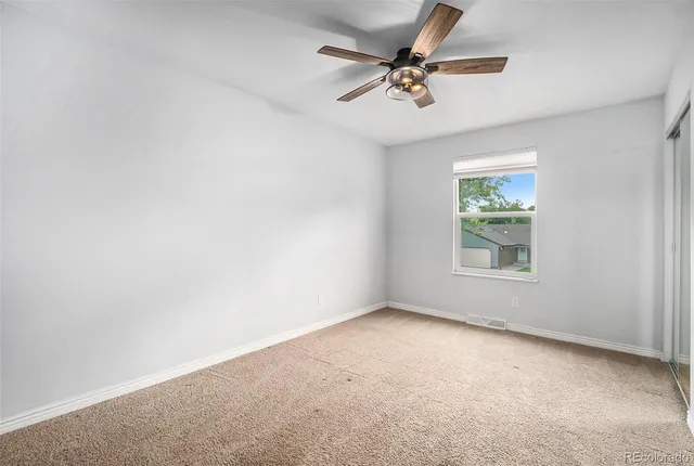 a room with pool table and a chandelier