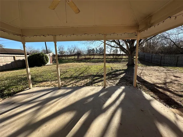 a view of a backyard of a house