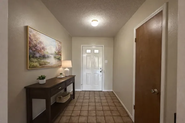 a view of a hallway with workspace