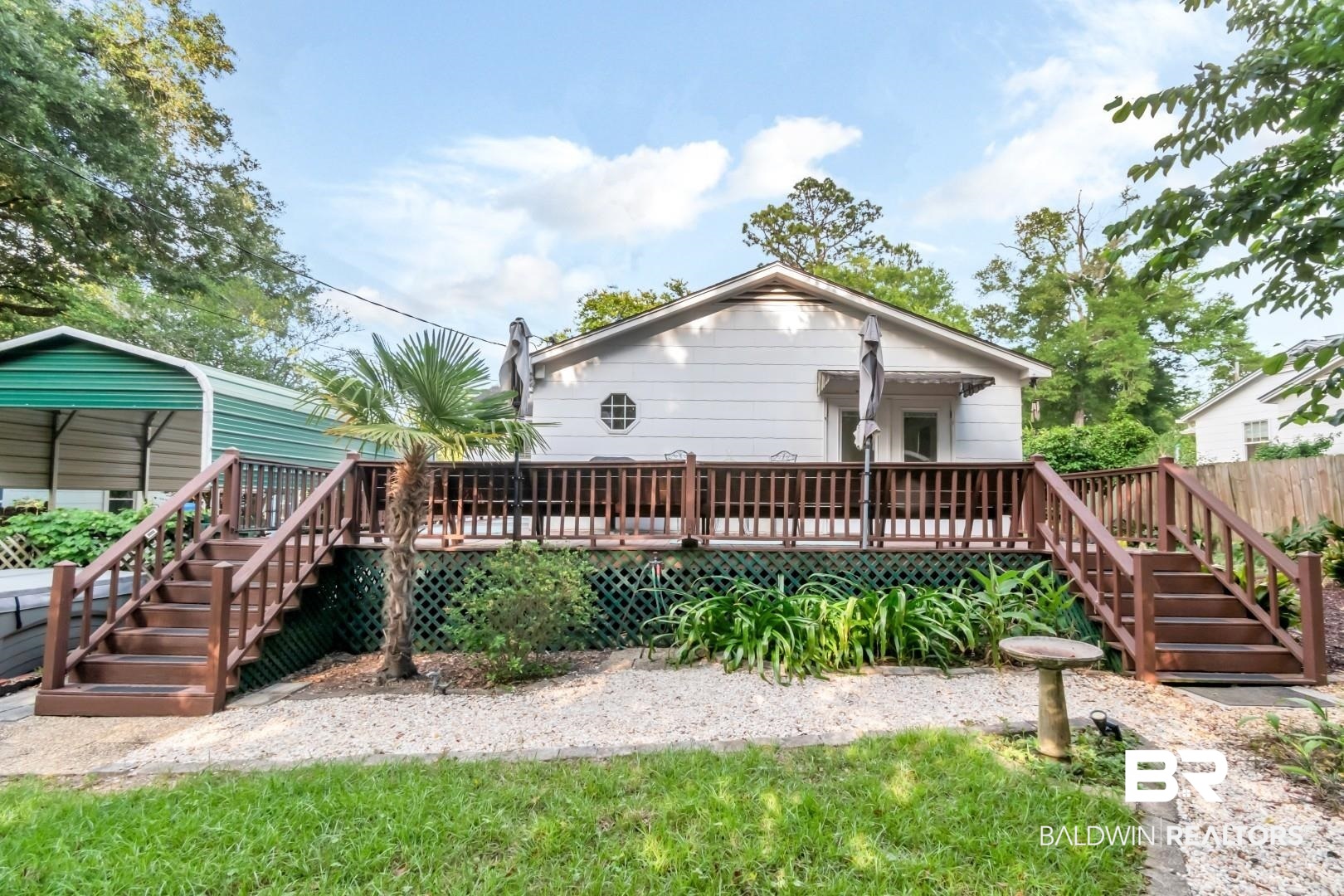 33 Lancaster Road Mobile, AL 36608 - Photo 37 of 40 Back of house with stairs and a wooden deck