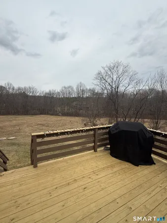 a house with wooden floor and outdoor space