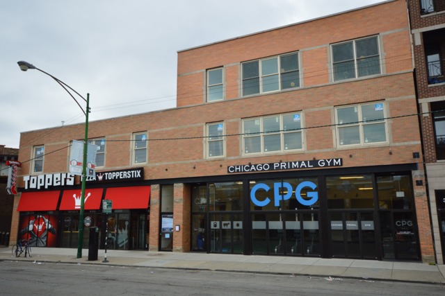 a view of a building with a street
