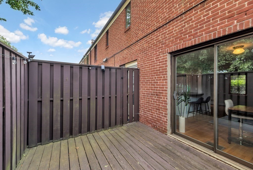 18 Pierce Road, Unit 18 Watertown, MA 02472 - Photo 23 of 38 a view of a wooden deck