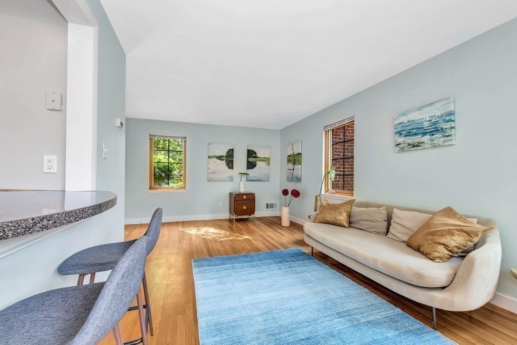 18 Pierce Road, Unit 18 Watertown, MA 02472 - Photo 27 of 38 a living room with furniture and a window