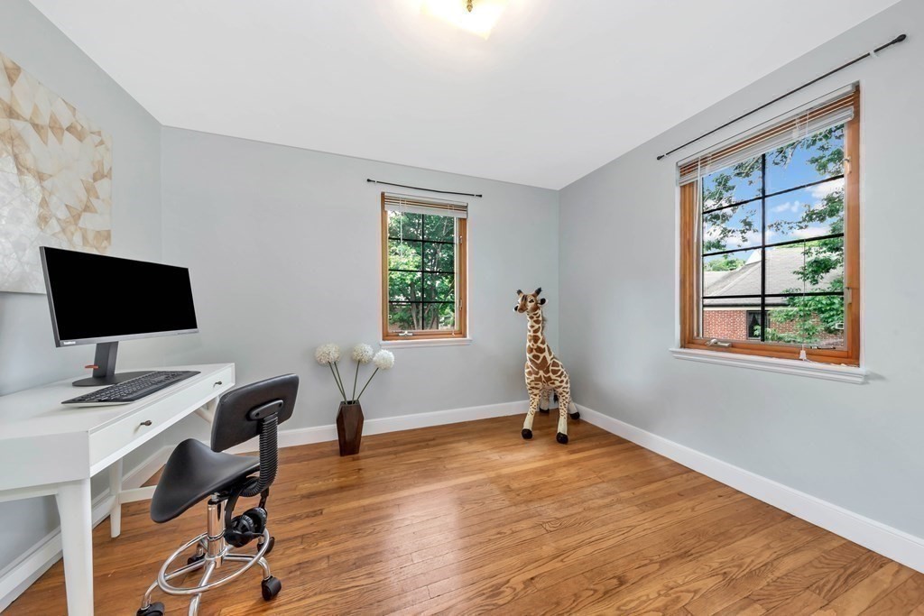 18 Pierce Road, Unit 18 Watertown, MA 02472 - Photo 28 of 38 a view of a workspace with furniture and a window