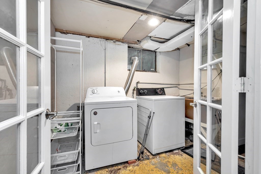 18 Pierce Road, Unit 18 Watertown, MA 02472 - Photo 36 of 38 a utility room with dryer and washer