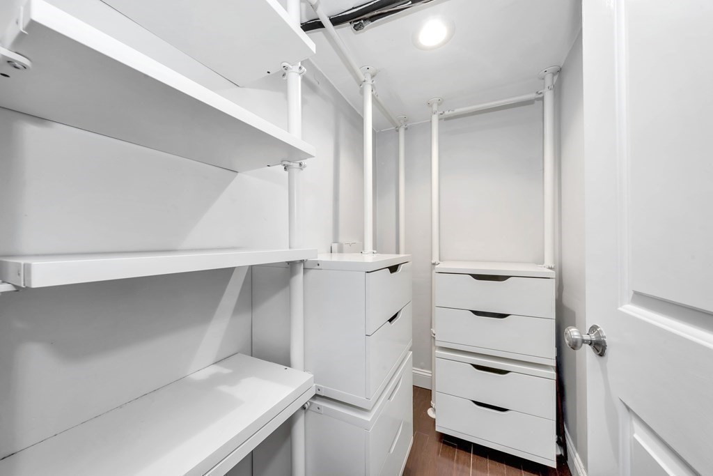 18 Pierce Road, Unit 18 Watertown, MA 02472 - Photo 37 of 38 a view of walk in closet with empty racks