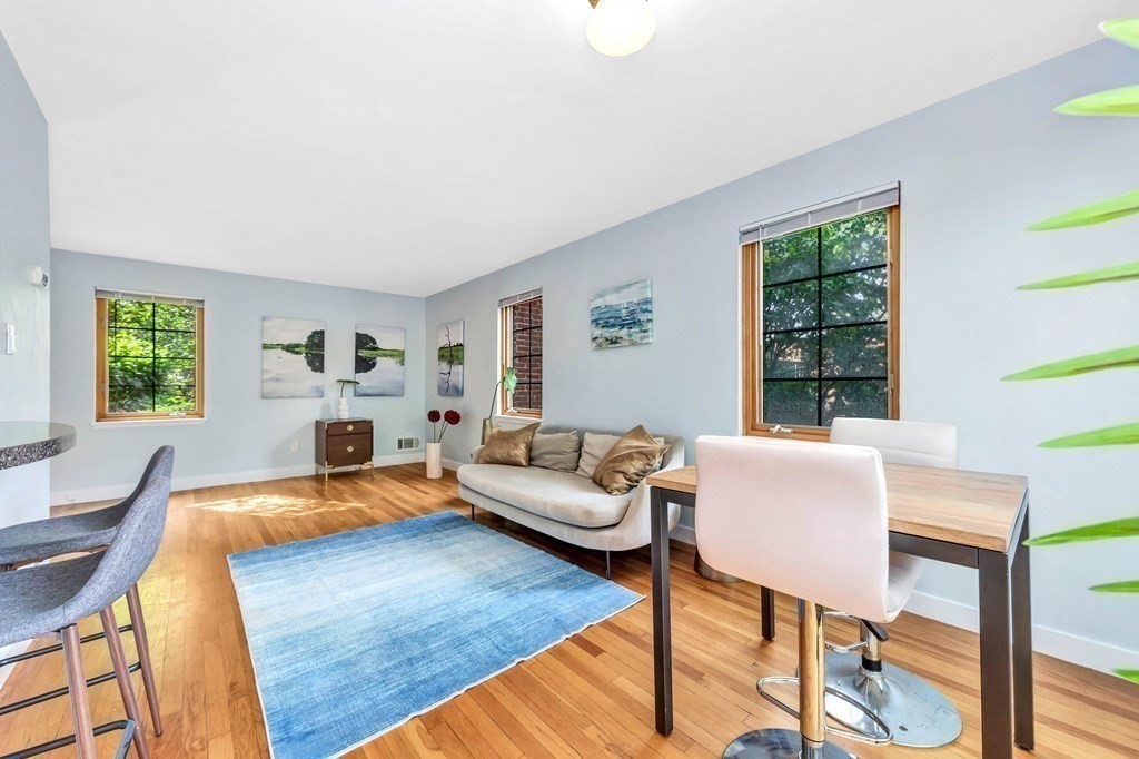 18 Pierce Road, Unit 18 Watertown, MA 02472 - Photo 4 of 38 a living room with furniture and a window