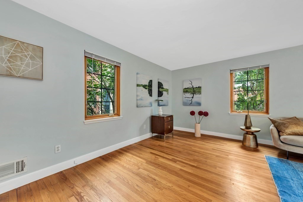 18 Pierce Road, Unit 18 Watertown, MA 02472 - Photo 5 of 38 a living room with furniture window and wooden floor
