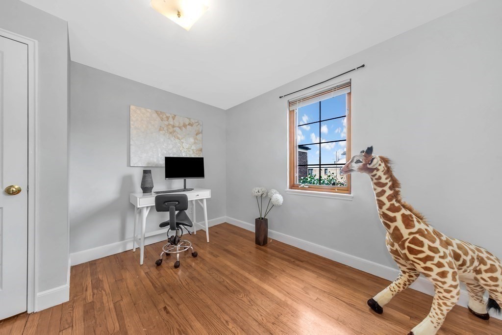 18 Pierce Road, Unit 18 Watertown, MA 02472 - Photo 10 of 38 a workspace with furniture and a window