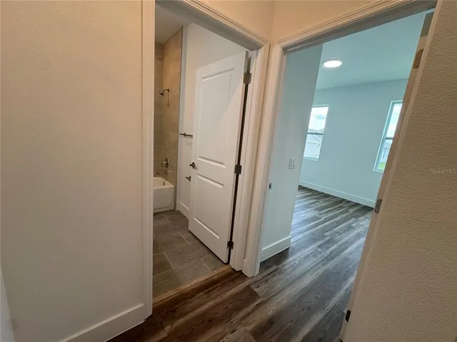 a view of an empty room and window