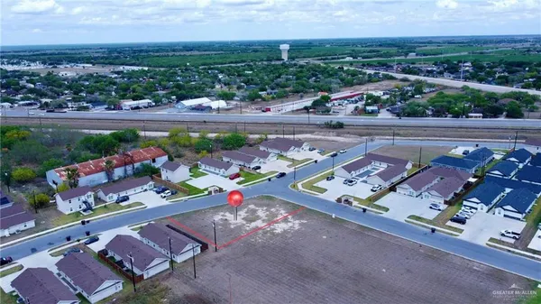 an aerial view of a chairs and table