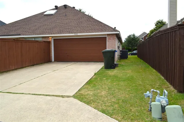 a backyard of a house with seating space