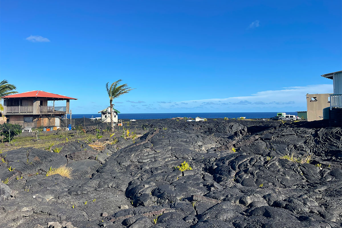 67 A Chain Of Craters Road Pahoa, HI 96778 - Photo 3 of 16 a view of a yard with an outdoor space