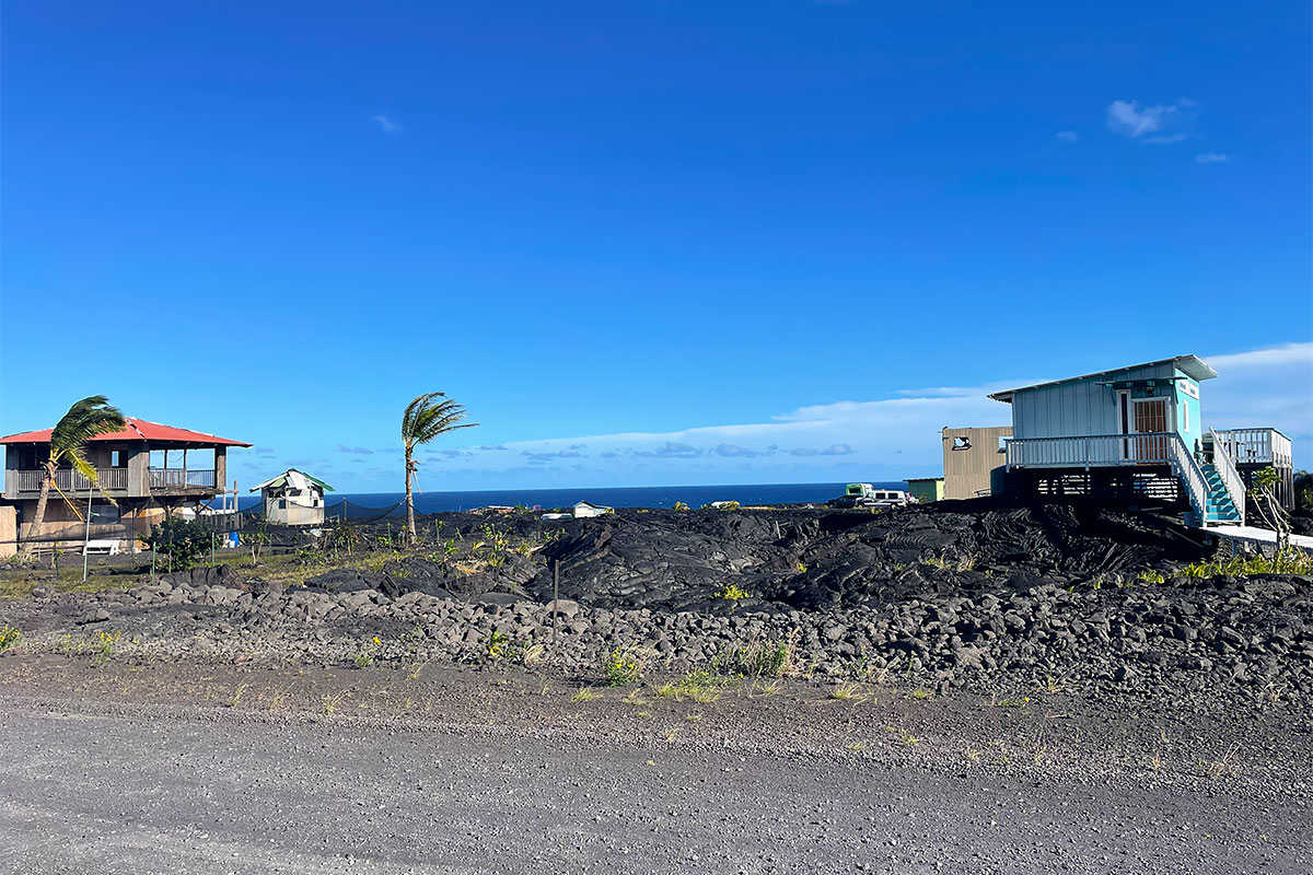 67 A Chain Of Craters Road Pahoa, HI 96778 - Photo 7 of 16 a view of a house with a yard