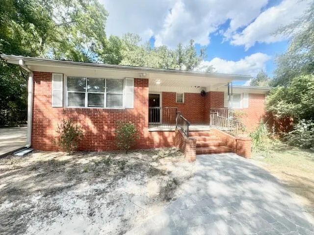 front view of a house with a outdoor space
