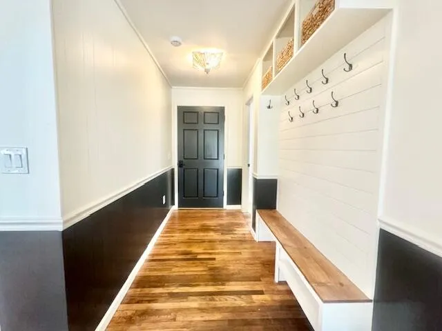 a view of balcony with wooden floor