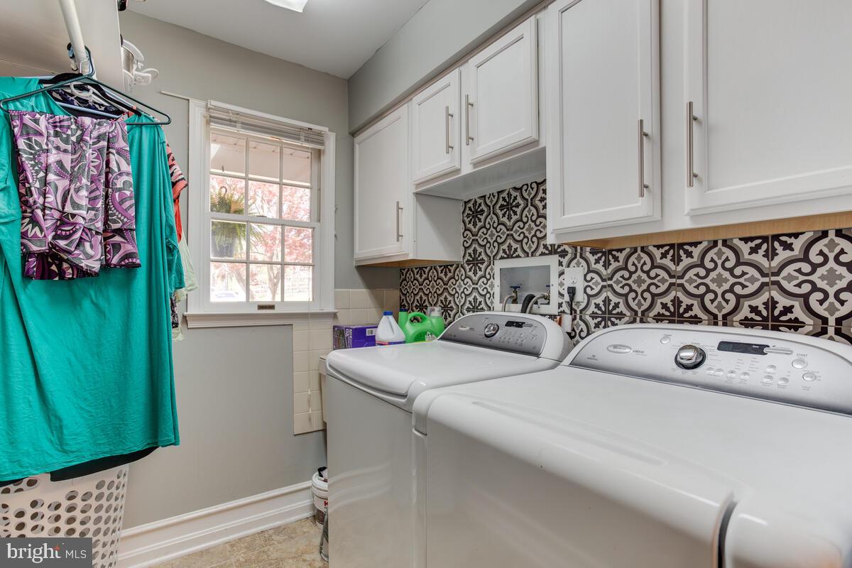 7883 Poplar Grove Road Severn, MD 21144 - Photo 48 of 77 a kitchen with a cabinets a sink and a window