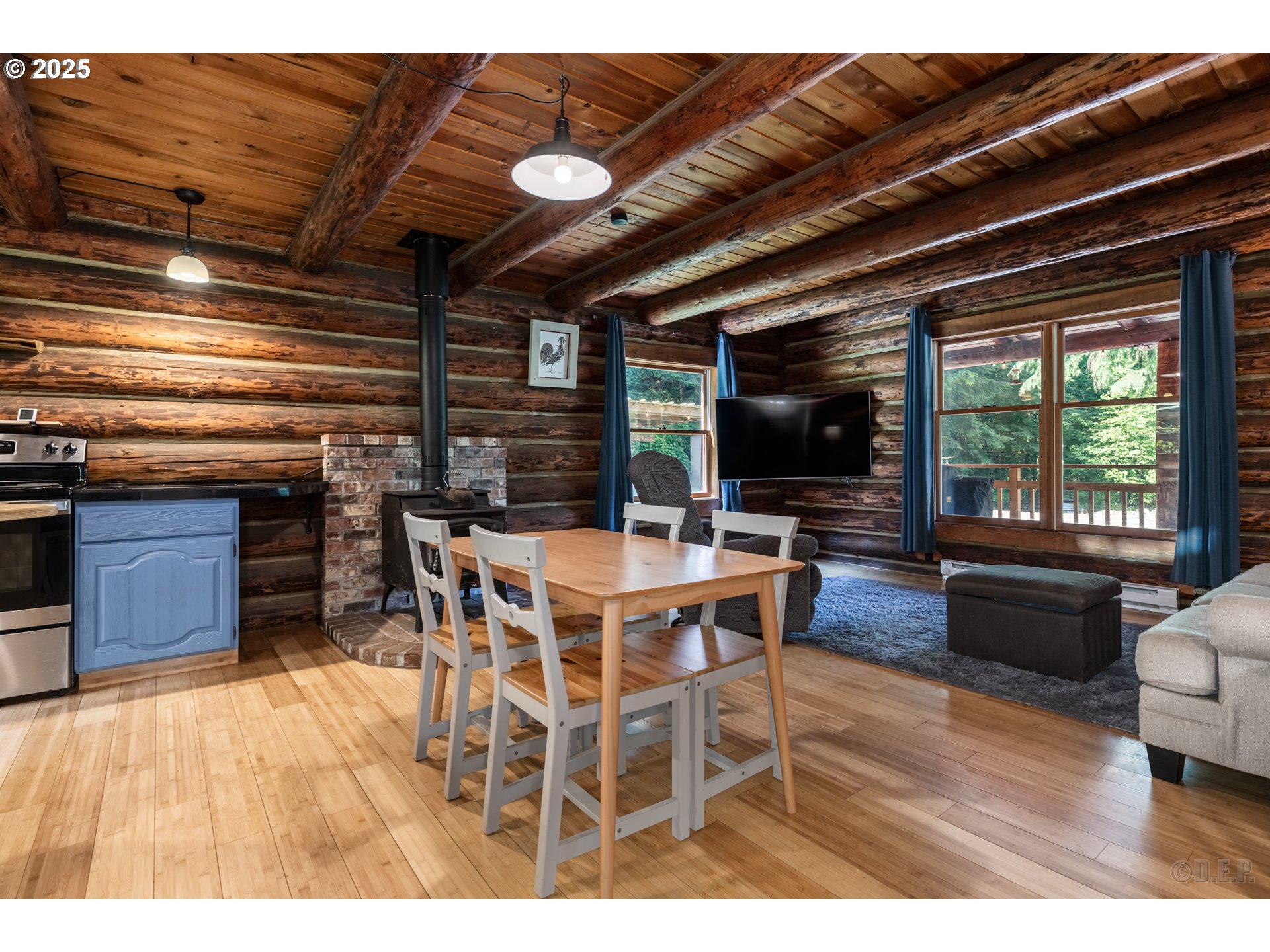 29050 Pittsburg Road St. Helens, OR 97051 - Photo 12 of 37 a view of a dining room with furniture window and wooden floor
