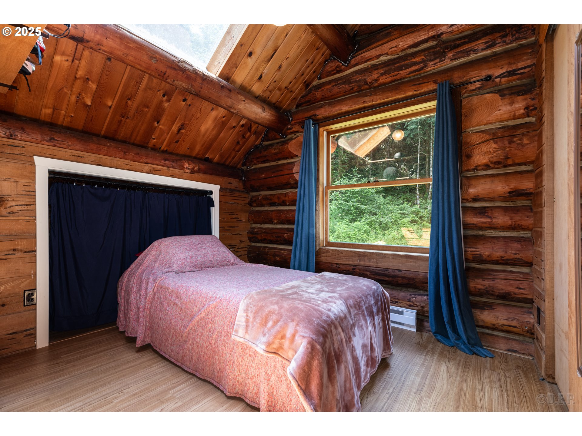 29050 Pittsburg Road St. Helens, OR 97051 - Photo 22 of 37 a bedroom with a bed and a dresser