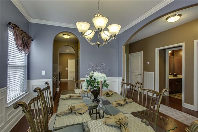 369 Truman Road West Franklin, TN 37064 - Photo 4 of 20 ENJOY FAMILY MEALS IN THIS LARGE DINING ROOM WITH BUTLER'S PANTRY, WAINSCOTING, ARCHED ENTRIES, HARDWOODS, CROWN MOLDING & 2" BLINDS