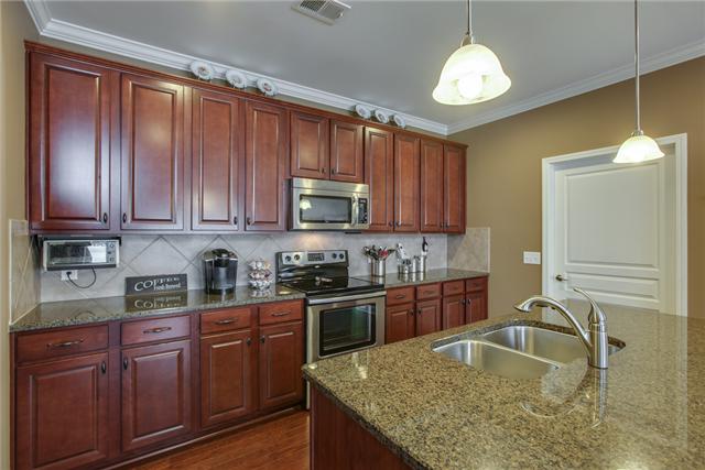 369 Truman Road West Franklin, TN 37064 - Photo 6 of 20 THESE BEAUTIFUL CONTERTOPS ARE ALSO IN THE OVERSIZED BUTLER'S PANTRY...THE LAUNDRY IS LOCATED JUST BEHIND THE DOOR AND IS RIGHT OFF THE GARAGE FOR EASY GROCERY LOAD IN