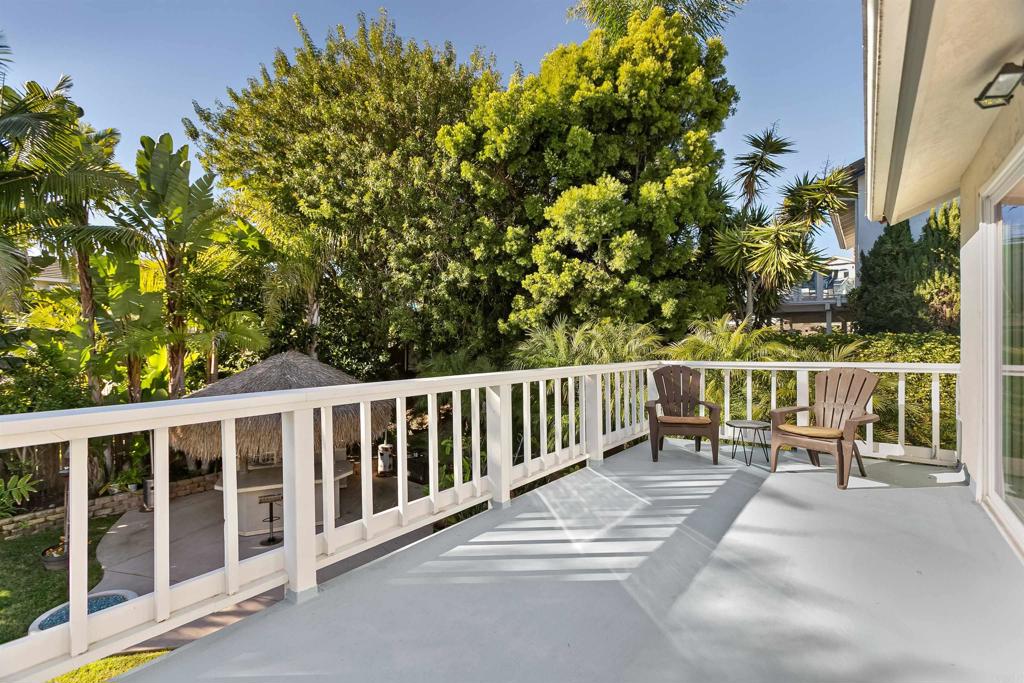 2252 Soledad Rancho Road San Diego, CA 92109 - Photo 19 of 39 a view of a chairs and table in the balcony