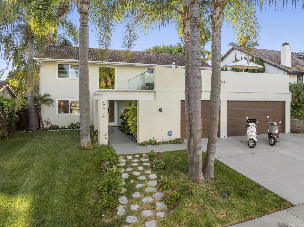 2252 Soledad Rancho Road San Diego, CA 92109 - Photo 37 of 39 a front view of a house with garden