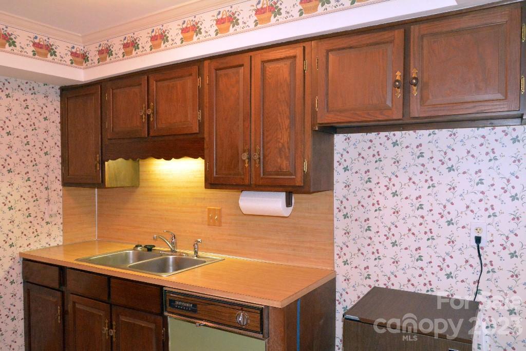 3508 Colony Road, Unit D Charlotte, NC 28211 - Photo 9 of 24 a bathroom with a sink and a mirror