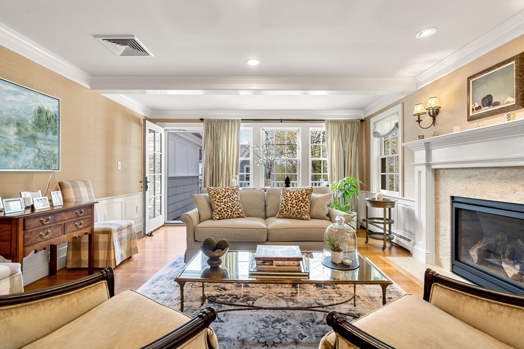 40 Morton Street Andover, MA 01810 - Photo 17 of 32 a living room with furniture fireplace and a large window