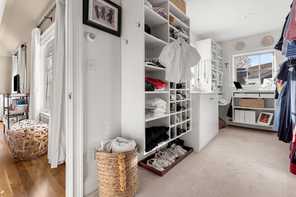 40 Morton Street Andover, MA 01810 - Photo 21 of 32 a view of walk in closet with clothes and shoes