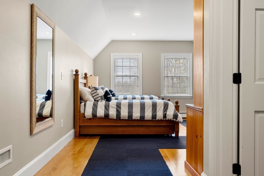 40 Morton Street Andover, MA 01810 - Photo 24 of 32 a bed sitting in a room next to a window