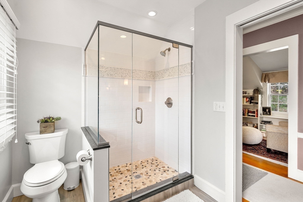 40 Morton Street Andover, MA 01810 - Photo 26 of 32 a bathroom with a shower and a toilet