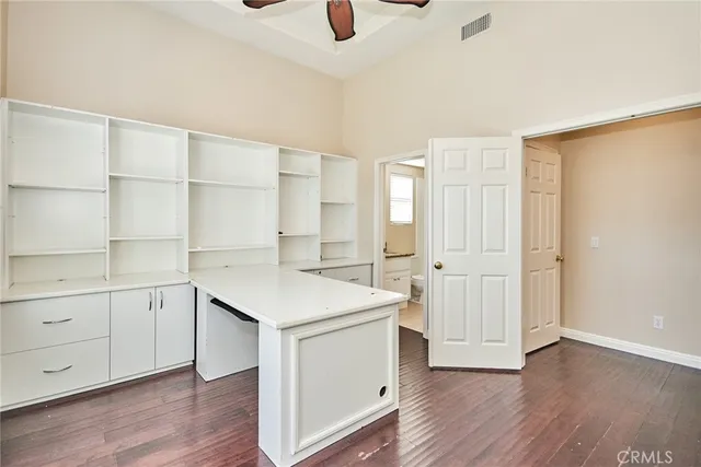 a view of an empty room and window