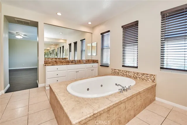 wooden floor with a bathroom