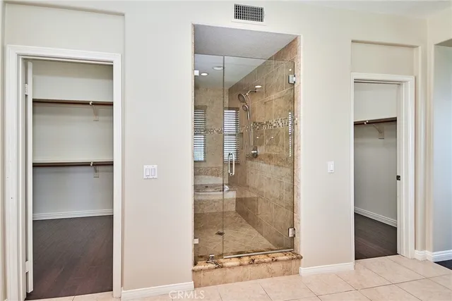 a view of a kitchen with wooden floor
