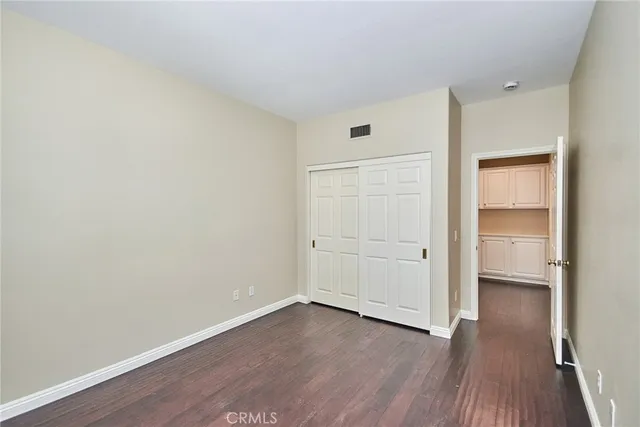 a view of a chairs and tables in patio with a backyard